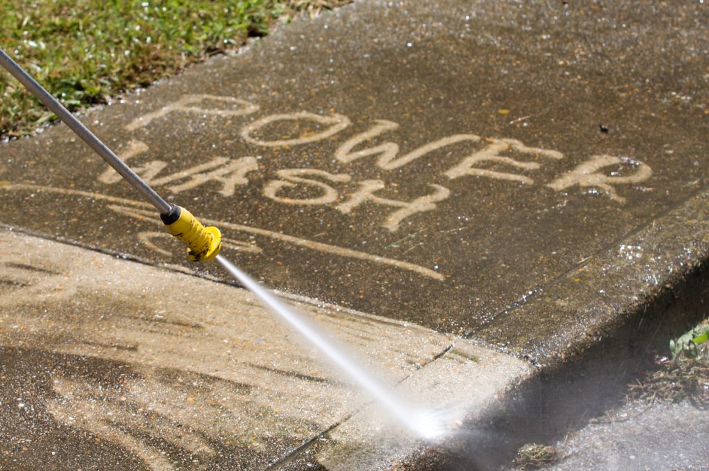 Power washing a home
